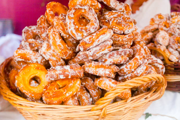 istock Fried doughnuts, rosquillas,  covered with sugar, close-up view. 2140234826