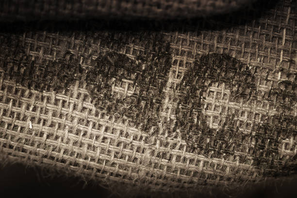 Dark brown burlap background. Jute sackcloth bagging canvas texture