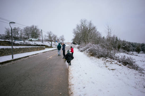 istock Family in the snow 2140285761