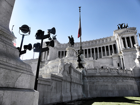 The National Monument to Vittorio Emanuele II or (mole del) Vittoriano, synecdochely called Altare della Patria, is an Italian national monument located in Rome, in Piazza Venezia, on the northern slope of the Capitoline Hill; it is the work of the architect Giuseppe Sacconi. It is located in the center of ancient Rome and connected to modern Rome thanks to streets that radiate out from Piazza Venezia