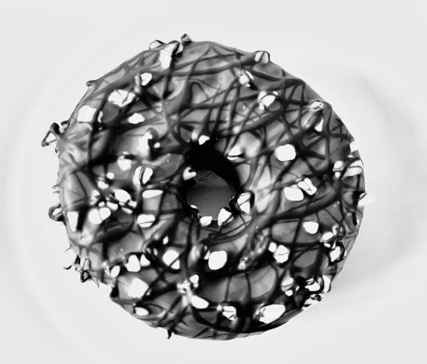 Close up of a chocolate ring doughnut