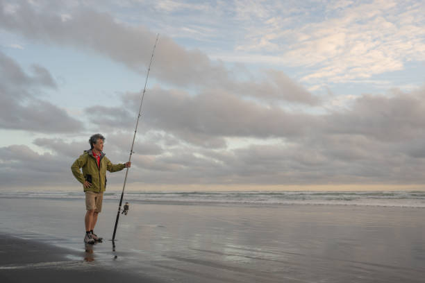 Oahu, Hawaii, February 28, 2018:  Fishing in the Pacific Ocean on the Leeward coast of Oahu
