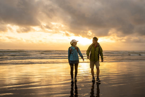 istock A Mature Couple Enjoying a Romantic Sunset Walk 2140340312