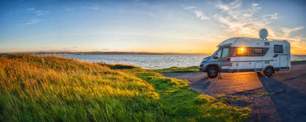 istock Motorhome at Loch Ryan during Sunset 2140396800