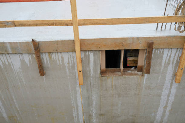 istock Construction site, concrete foundation of big house in rain 2140425060