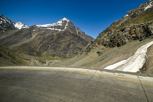 View of mountains in the Andes mountain range near Portillo in summer with little snow