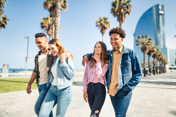 istock friends walking in barceloneta 2140439562