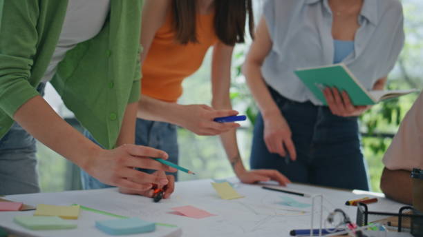 istock Creators hands brainstorming ideas at desk close up. Motivated coworkers working 2140439563