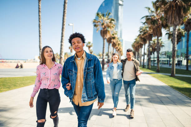 istock friends walking in barceloneta 2140445333