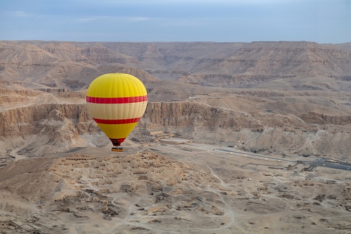 Desert outside Dubai city viewed from hot air balloon. This photograph was taken at dawn with full frame camera and Zeiss wide-angle lens.