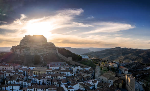 aerial view of morella, spain, considered one of the most beautiful pueblos in the country - spain flag built structure cloud imagens e fotografias de stock