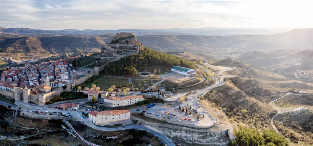 aerial view of morella, spain, considered one of the most beautiful pueblos in the country - spain flag built structure cloud imagens e fotografias de stock