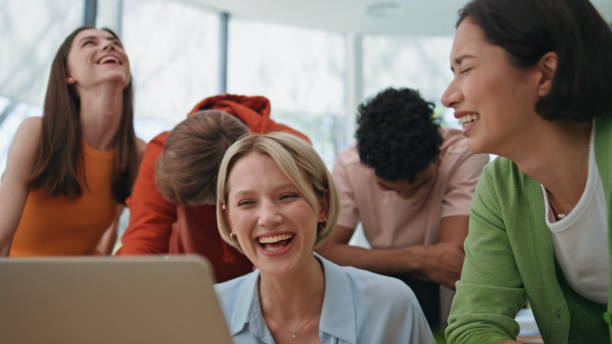 istock Startup agency team laughing laptop at workplace closeup. Happy group having fun 2140478152