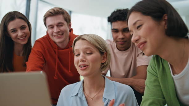 istock Office coworkers videocalling laptop at workplace closeup. Happy group talking 2140480743