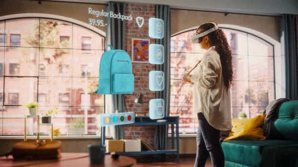 istock Black Woman Using Virtual Reality Headset for Online Shopping, Browsing through Stylish Handbags items. Ordering from Mock-up Internet Store App for e-Commerce products. Augmented Reality Concept. 2140488903