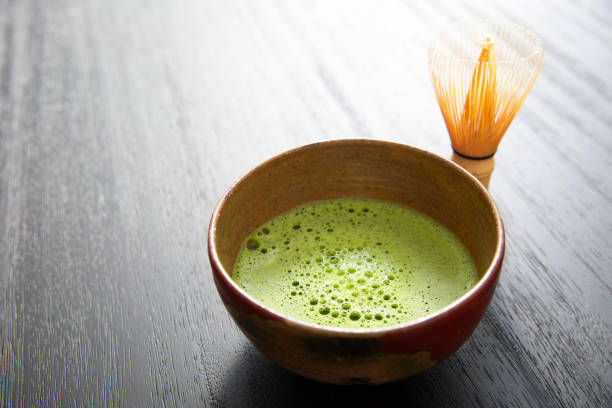 istock Tea ceremony, matcha, matcha tea bowl and chasen on a black table 2140490997