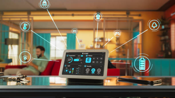 istock Creative Smart Home Device with Dark Theme Infographics Shown on Display with Concept Icons. Person using Smartphone to Control The House. IOT Connected Wireless Intelligent System Concept. 2140491017