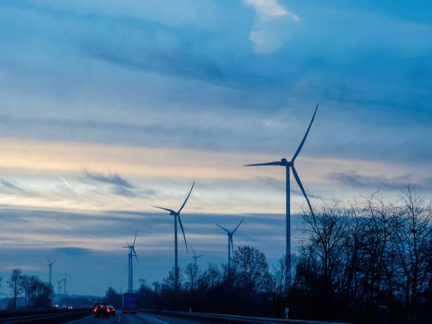 istock Windmills producing renewable electricity, turbine generator 2140494218