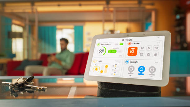istock Creative Smart Home Device with Light Theme Infographics Shown on Display and Icons With Functions. Person using Smartphone to Control His stylish House. IOT Connected Wireless Intelligent System 2140494748