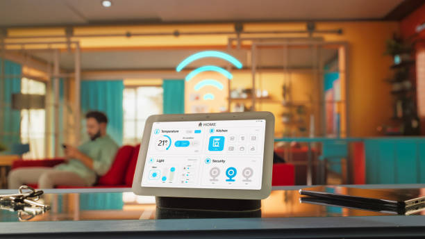istock Creative Smart Home Device with Light Theme Infographics Shown on Display with Wifi Icon. Person using Smartphone to Control His stylish House. IOT Connected Wireless Intelligent System. 2140495833