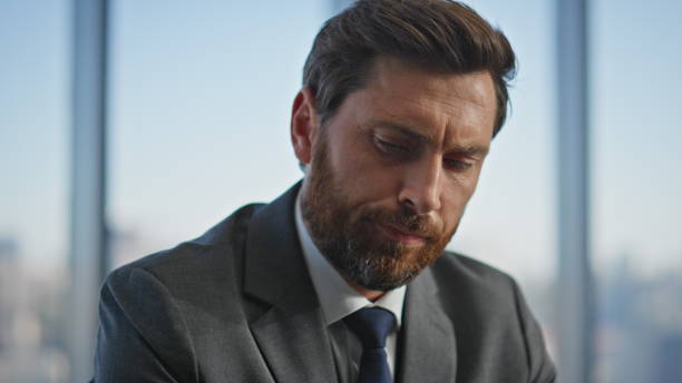 istock Serious businessman drink coffee in panoramic office closeup. Pensive man rest 2140505026