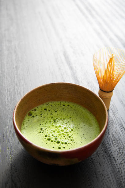 istock Tea ceremony, matcha, matcha tea bowl and chasen on a black table 2140516731