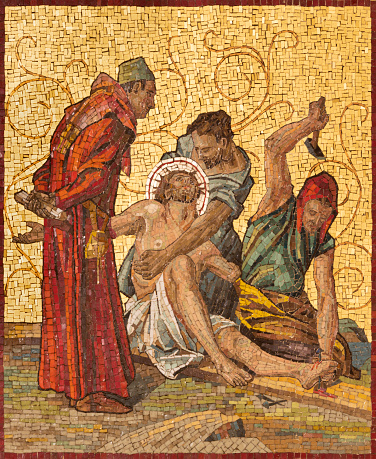 Milan - The mosaic Jesus is nailed to the cross as part of Cross way station in the church Chiesa di San Agostino