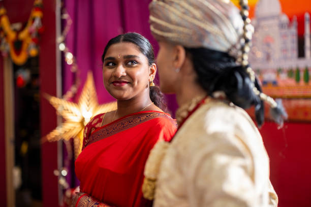 istock Warm Cultural Exchange in Traditional Attire 2140540954