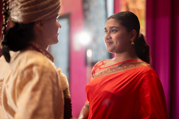 istock Intimate Cultural Exchange in Vibrant Attire 2140540963