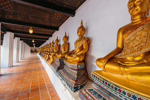 Two novices walking and talking in old temple at Ayutthaya Province, Thailand