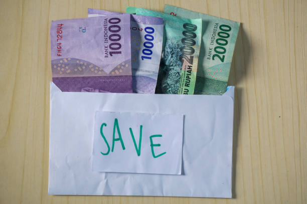 istock Rupiah money on a white envelope. THR on Eid al-Fitr or Eid days 2140556802