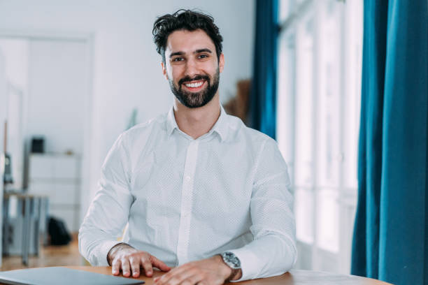 istock Successful businessman in modern office working on laptop. 2140578546