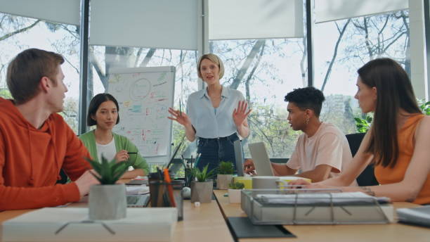 istock Diverse people corporate training at office pov view. Group teleconference event 2140620605