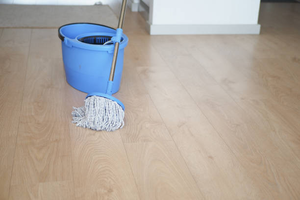 istock cleaning tiles floor with mop 2140621155