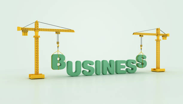 istock BUSINESS Word with Tower Crane 2140625018