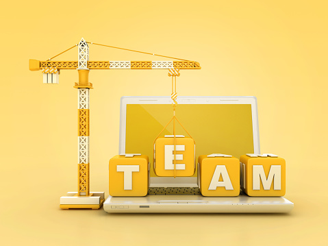 TEAM Blocks with Tower Crane on Computer Laptop - Color Background - 3D Rendering