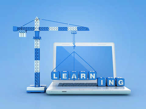 LEARNING Blocks with Tower Crane on Computer Laptop - Color Background - 3D Rendering