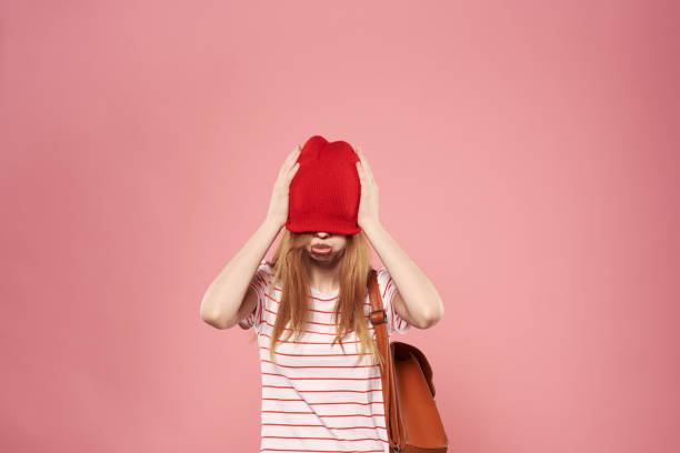 istock Cheerful woman studio lifestyle pink background fun model 2140636711