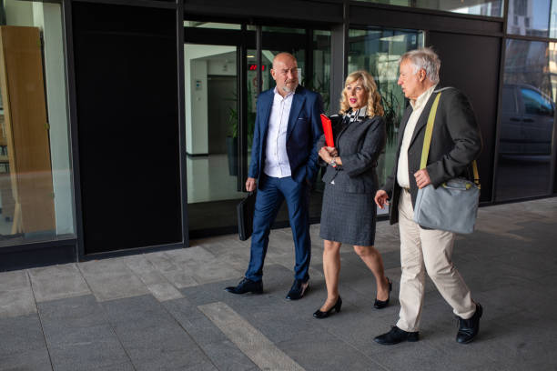 istock Business professionals talking to each other on their way to work 2140659460