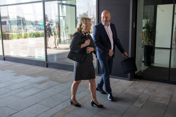 istock Business professionals talking to each other on their way to work 2140660510