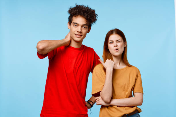 istock man and woman in multicolored t-shirts communication emotions modern style 2140681984