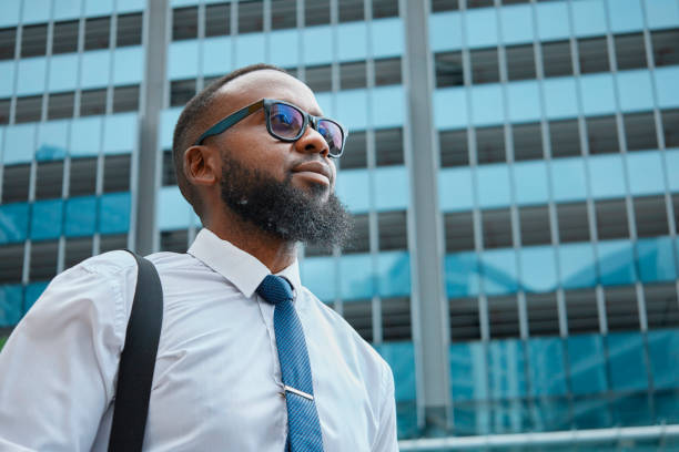 istock Professional Black Man in Business Attire at Urban Setting 2140692436