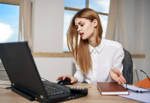 istock Woman secretary working desk laptop work office manager communication 2140755387