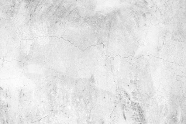 istock The surface of a cracked raw concrete wall background 2140822271