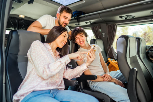 istock Friends checking social media while traveling by bus 2140822807