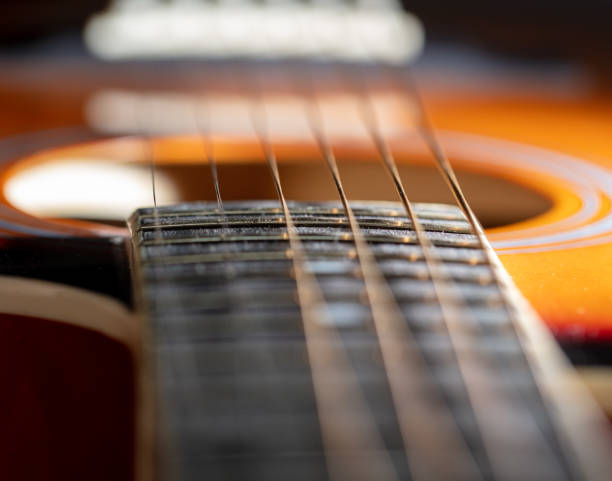 istock Strings on an acoustic guitar. Close-up 2140831178
