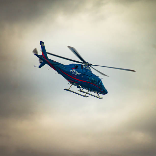 Life Flight Network medical transport helicopter in flight. Taking off / landing at Sacred Heart Medical Center in Spokane, Washington USA.