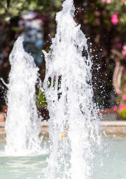 istock Splashes of water from a fountain as a background 2140847341