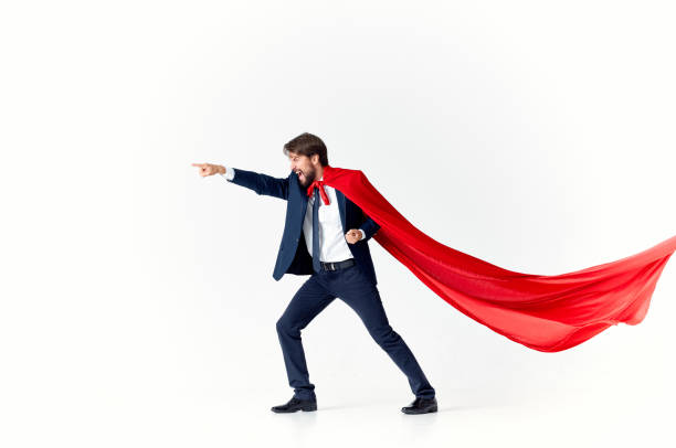 istock business man with red cloak superhero on light background success victory 2140864005