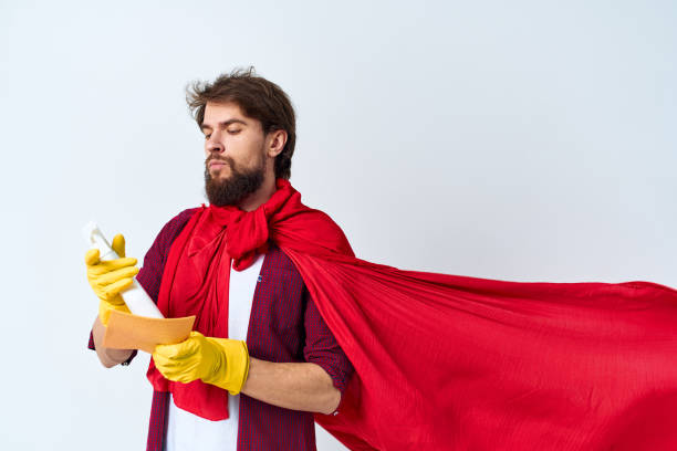 cleaner wearing a red coat detergent service housework cropped view Professional. High quality photo